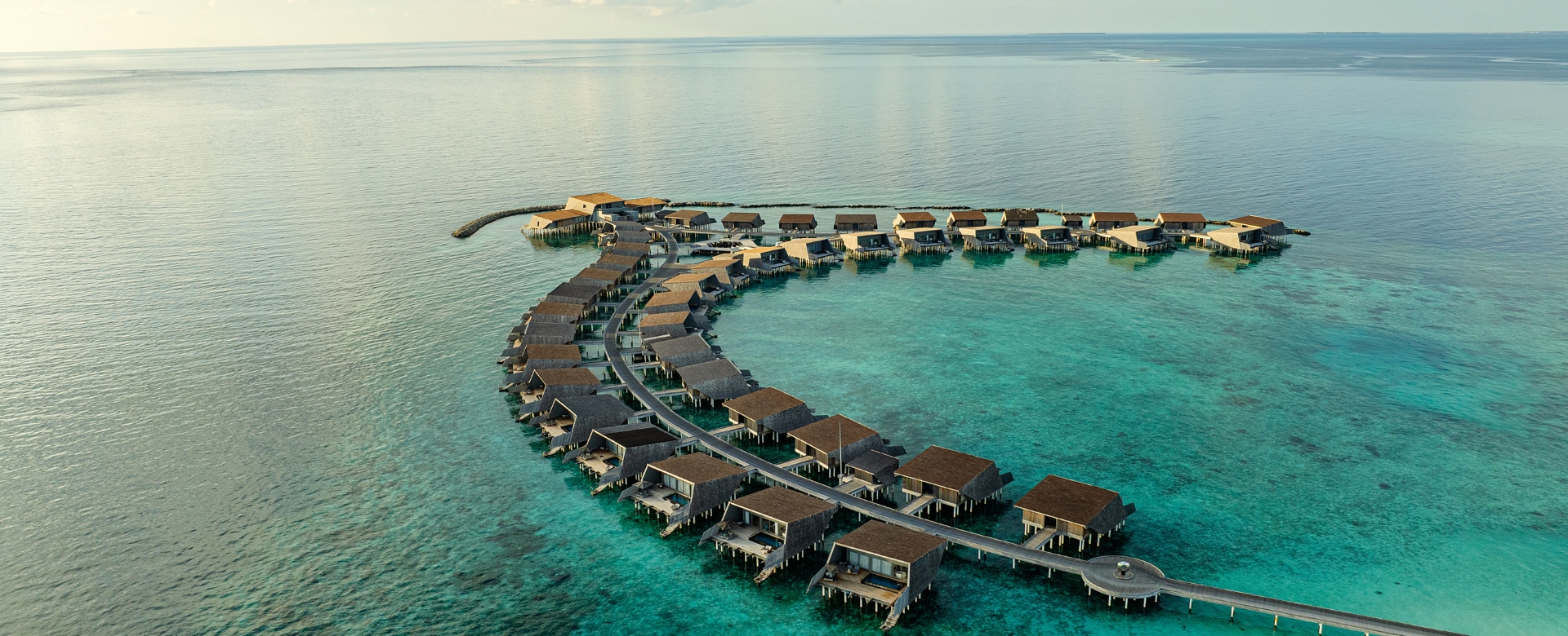 The St. Regis Maldives Vommuli Resort - Aerial - Overwater Villas